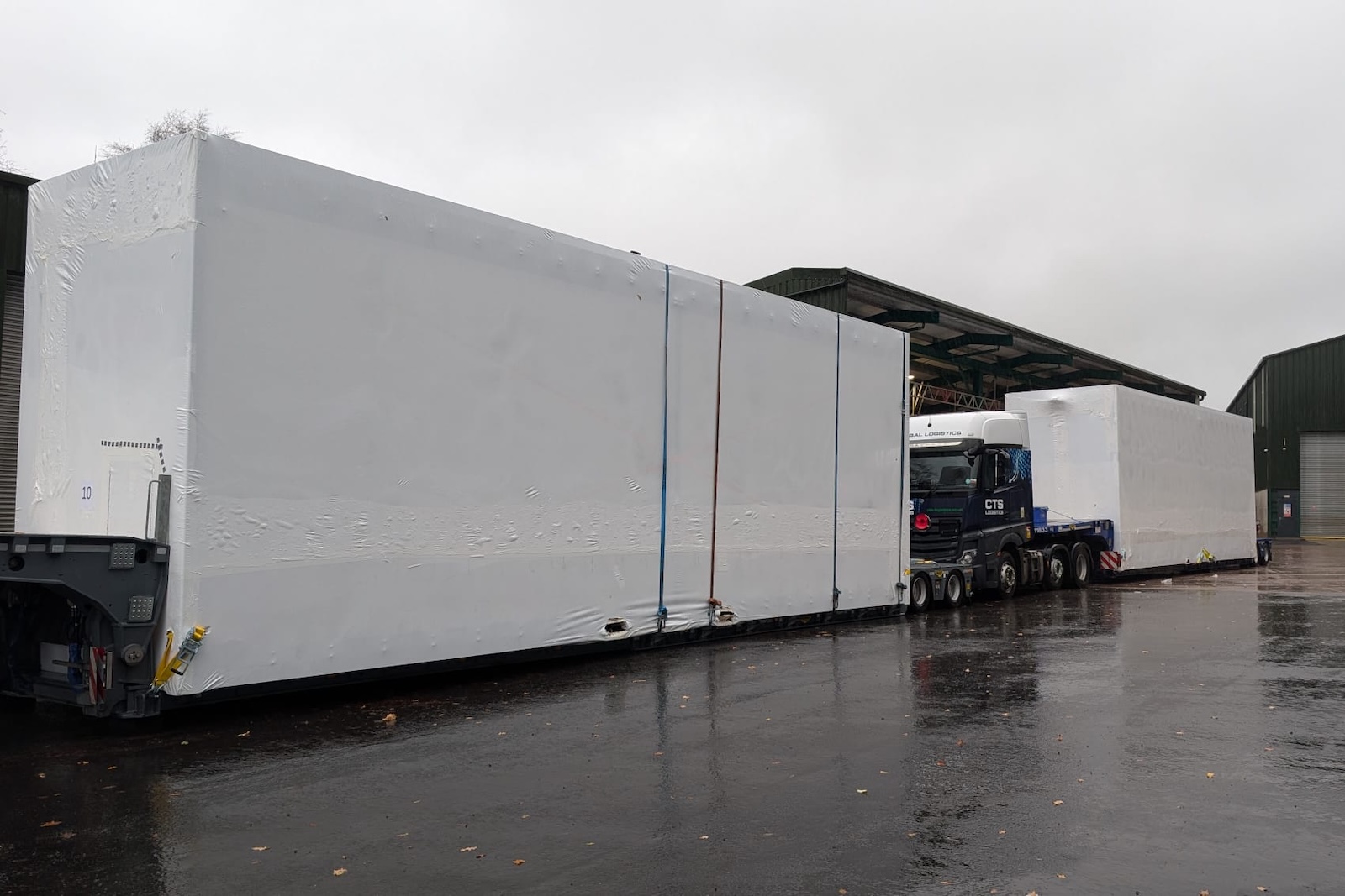 Modular components for a high security building being prepared for delivery